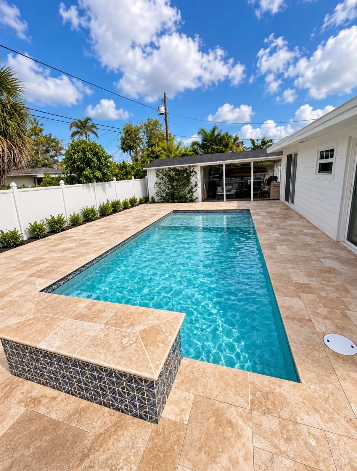 Rectangular pool with raised water feature