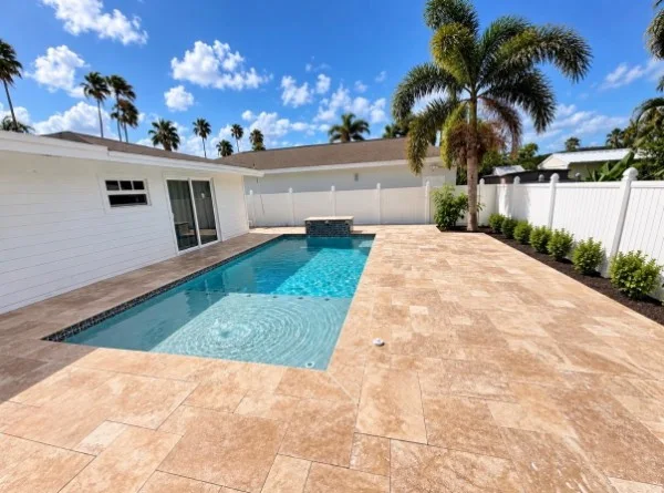 Pool with travertine patio